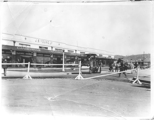 Road works being carried out in front of J.B. Youngs Store in Kingston. Probably Giles Street.