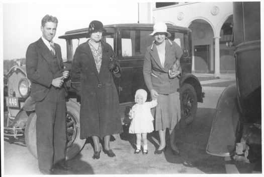 Irwin Prowse, Mrs J. Prowse, and Mrs J.H. Benson (nee Prowse) and small girl, Val Emerton (nee Benson) near the Sydney Building, City. 