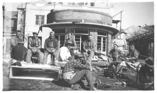 Workmen doing additions to Government House.