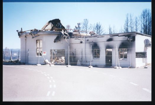 Bush fire damage to Mt Stromlo building          

