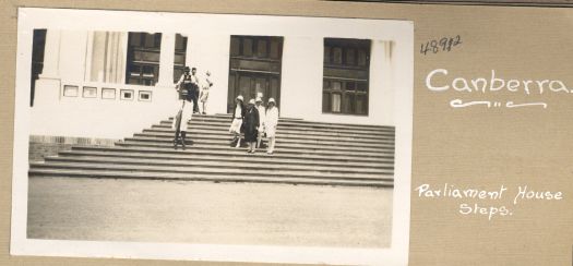 A group photo taken on the steps of Parliament House