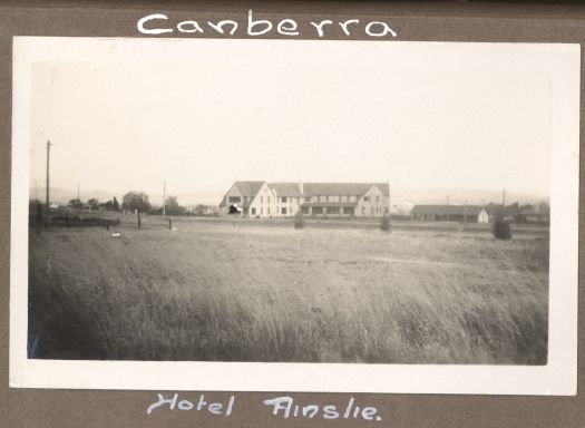 A view of the Hotel Ainslie across the paddocks


