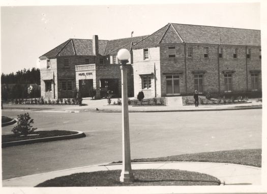 Photo shows the left side and front of Hotel Civic