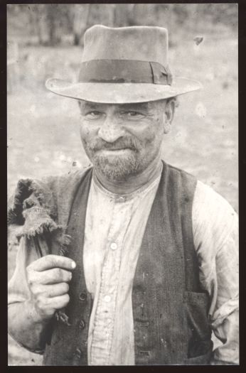 George Wells with sugar bag over his shoulder