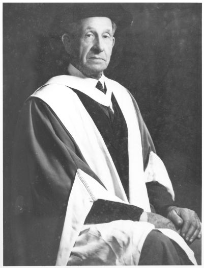 Portrait of Sir Robert Garran in academic robes.