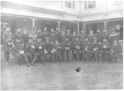 Group photo of senior military personnel, politicians and academics at RMC. Taken in front of Duntroon House.