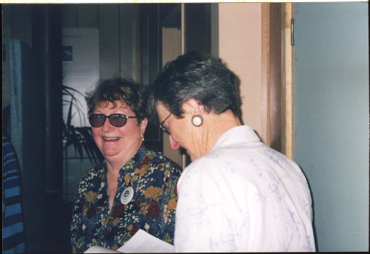 Val Emerton talking to Meryl Hunter at the CDHS rooms at the Canberra Museum & Gallery in Civic.