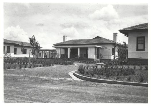A front view of Gorman House and gardens