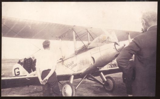 Spectators inspecting Bert Hinkler's aeroplane after landing in York Park, Canberra in March 1928