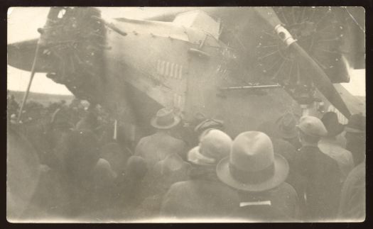 A close view of the crowd in front of the plane