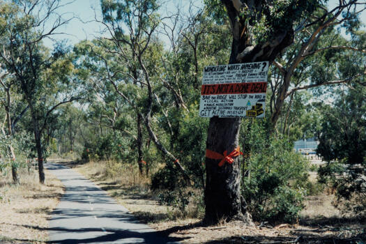 Save the Ridge protest sign on the cycle path near Canberra Stadium.