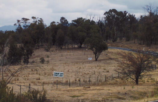 Protest sign on the Naas Road, just below Mt. Tennent, opposing the proposed Tennent Dam.