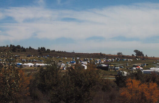 View from ACT Bushfire Memorial to tents erected for 24 hour cycle race at Stromlo Forest Park.