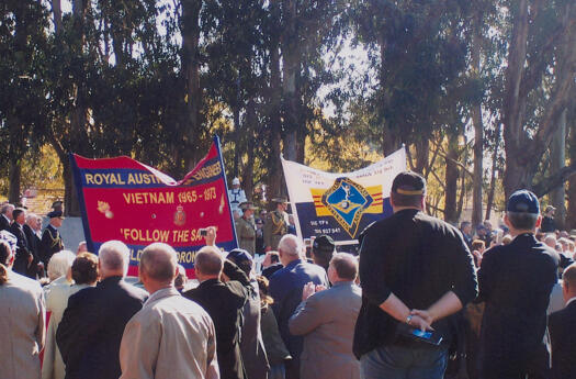 View of the crowd and banners on Anzac Parade