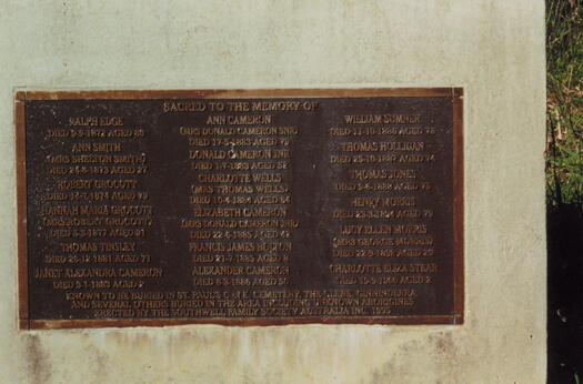The plaque to commemorate those buried at St. Paul's Church of England, Ginninderra at a park in Sharwood Crescent, Evatt.