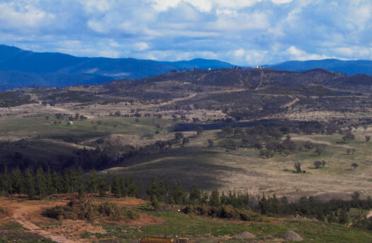 1 of 3 photos. View south west from Dairy Farmers Hill to Mt Stromlo.