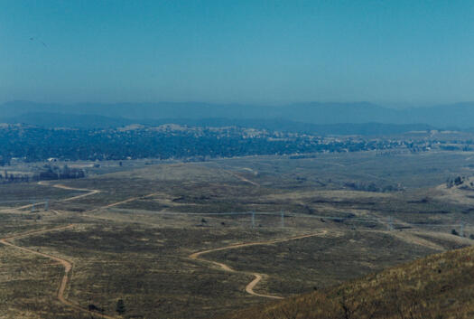 Dairy Farmers Hill south over Greenhills plantation post 2003 bushfires to Molonglo River