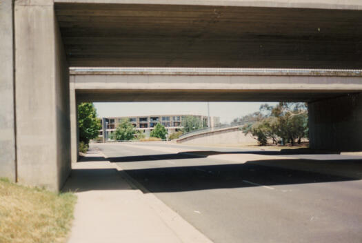 Forum Apartments taken from London Circuit beneath Commonwealth Avenue overpass