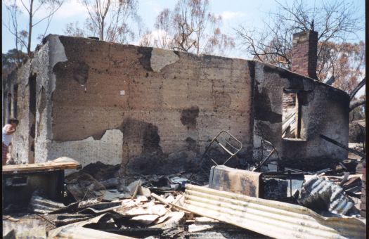 Collection of 24 photographs taken around the Tidbinbilla Nature Reserve, Nil Desperandum, Rock Valley and Flints Picnic Ground showing the aftermath of the fires of 17-18 January 2003. 