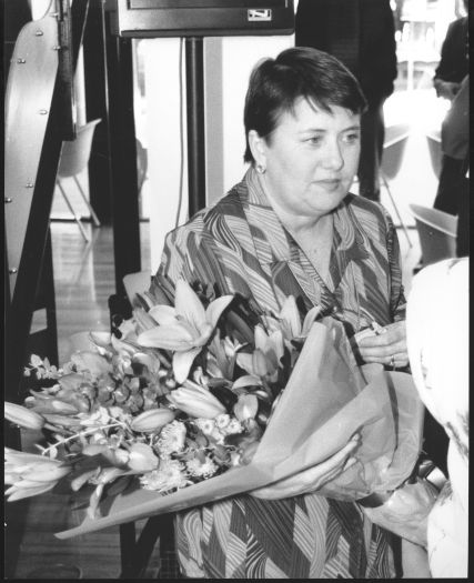 Canberra Day Oration. Woman with boquet