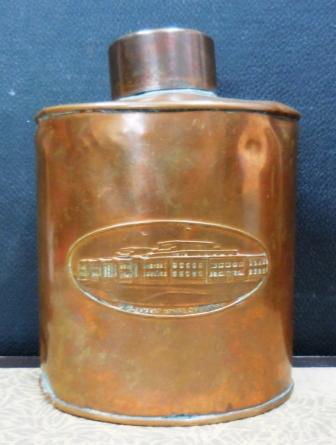Tea canister with pressed image of Parliament House 