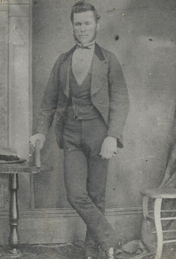 Photographic portrait of Phillip Pooley.