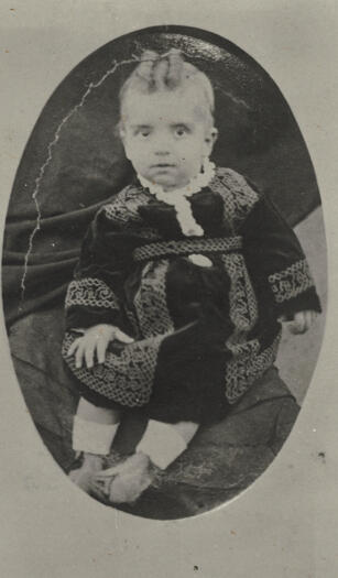 Reverse notes that John James Smallhorn was born 8 February 1876. Robert Baxter gave his location as at Young. Photograph dated June 1877.