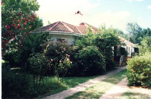 Original brick rendered house probably in Reid showing its driveway