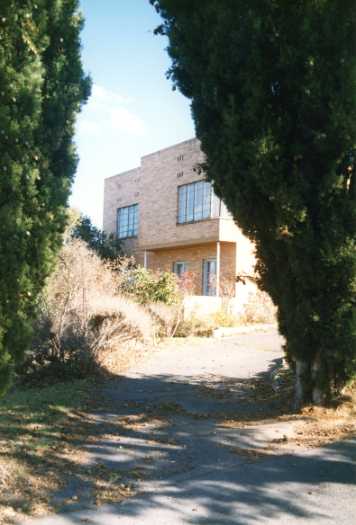 Driveway leading to a two story brick house in Evans Crescent, Griffith