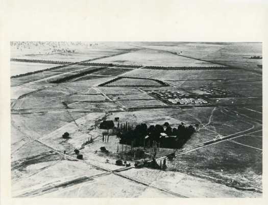 Shows trees surrounding the rectory, Gorman House, Northbourne Avenue, Haig Park and the railway line running to Civic