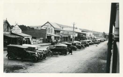 Monaro Street, Queanbeyan with cars parked in the middle of the street