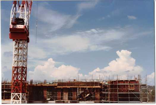 Crane at left of building works