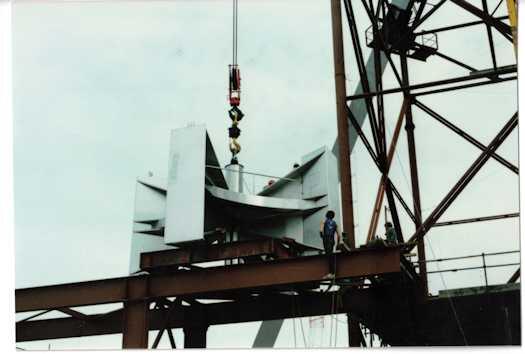 Flag pole cluster positioned on tracks