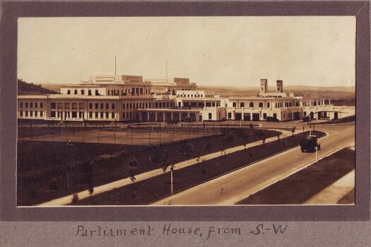 View of the rear of Parliament House from the SW, probably from West Block, along Queen Victoria Terrace