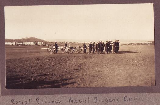 Sailors pulling artillery guns during the opening of Parliament House on 9 May 1927