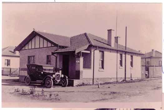 House with car outside. Emerton describes location as corner ofGiles Street and Wentworth Avenue.