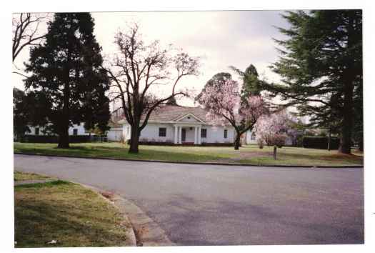 This FCC type 11 house features a 4 column porch.