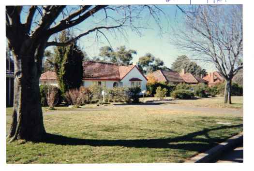 Old houses fronting wide nature strip. Kingston/ Griffith heritage housing precinct. One was the Burden house.