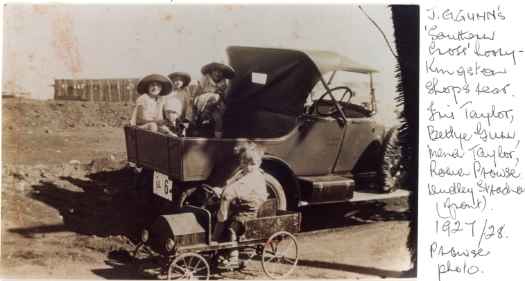 The children are: Iris Taylor, Bettye Gunn, Mena Taylor, Rowen Prowse, Dudley Strachan (in toy car).