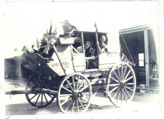 Jack Saunders at front and two men in the carriage.
