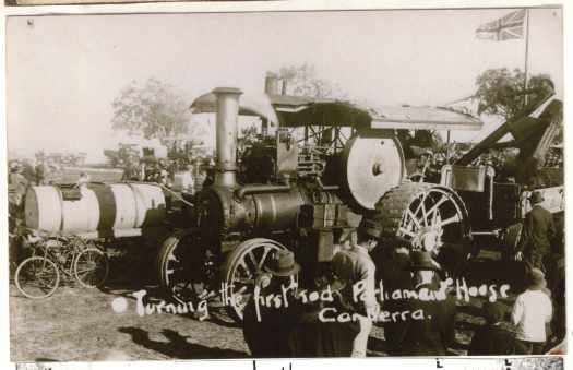 Post card from Harold Strachan who drove the traction engine that powered the steam shovel that turned the first sod. Shows traction engine and water tanker.
