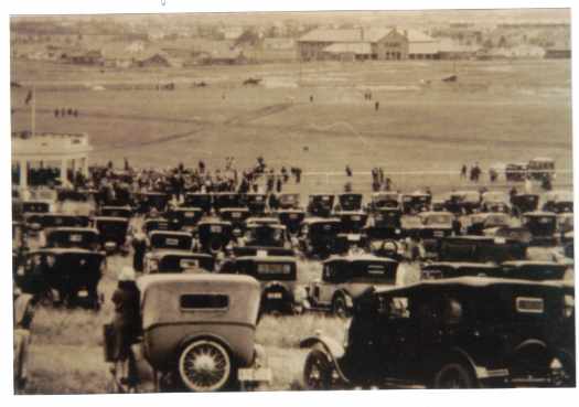Shows many cars and Brassey Hotel in background.
