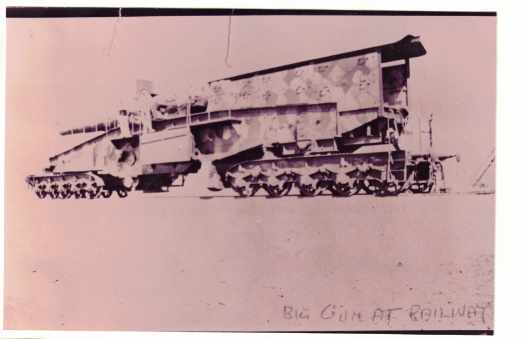 The gun including the complete carriage on rails.