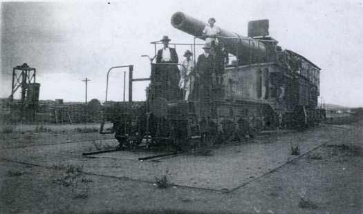 Looking to front of the gun which is on rails. Beadman family standing on front.